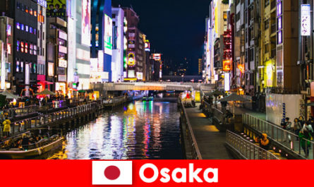 Bairros de entretenimento e iguarias aguardam viajantes estrangeiros em Osaka, Japão